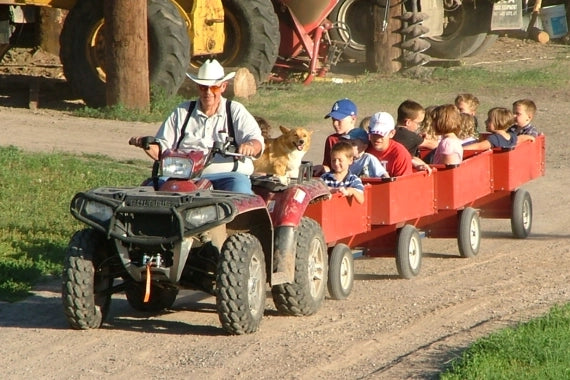 Riding on a train-tractor
